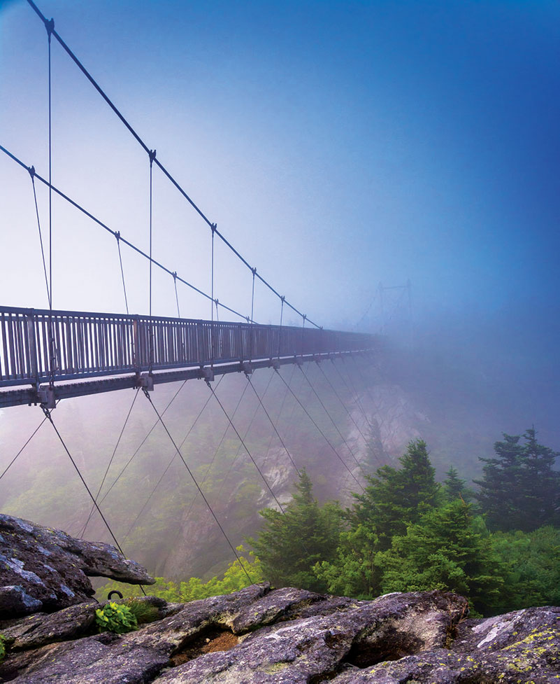 Mile-High Swinging Bridge disappearing into misty fog on Grandfather Mountain