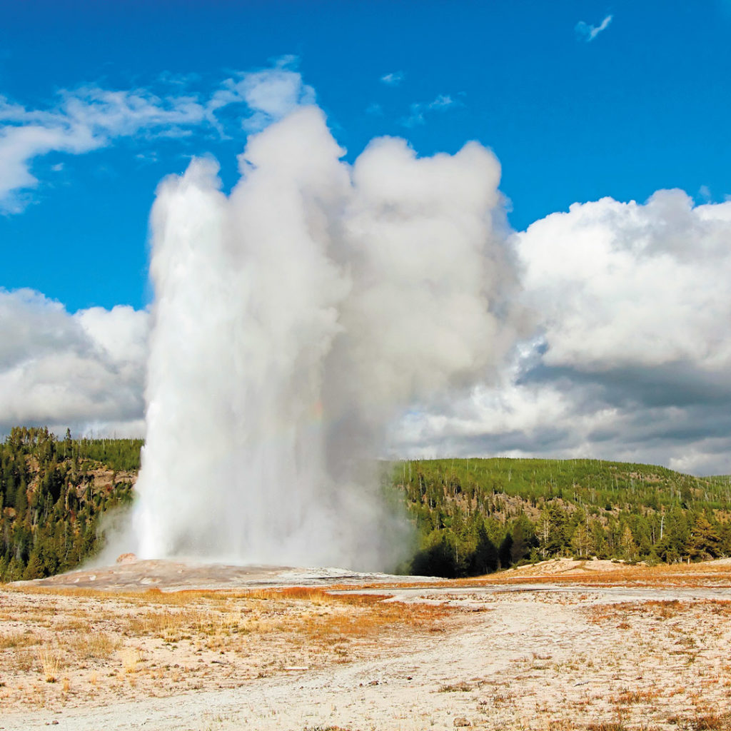 Old Faithful erupting in Yellowstone National Park