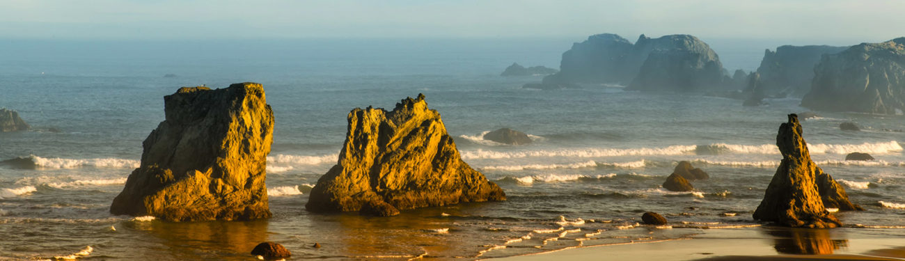 Rocky sea stacks rise out of the water at Bandon, Oregon