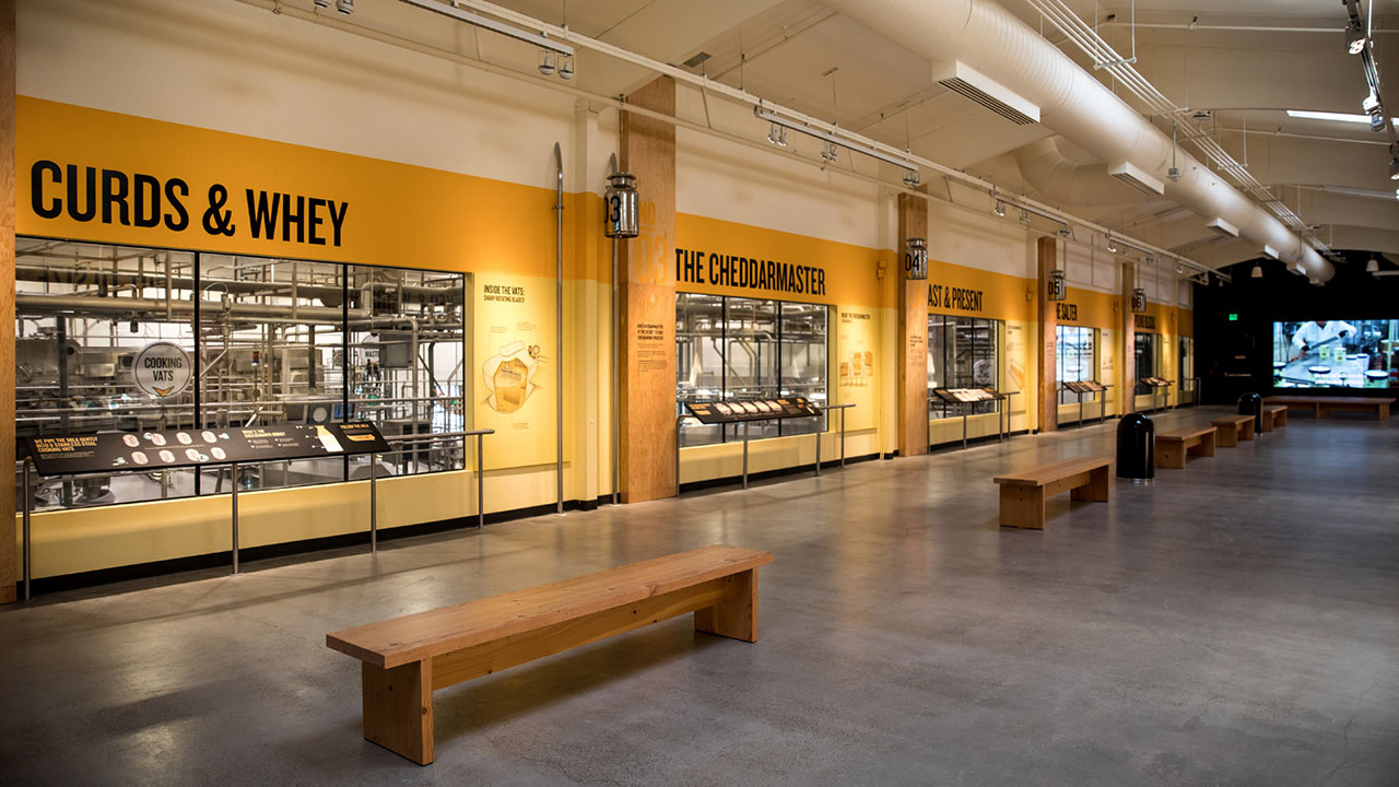 Inside viewing area of the Tillamook Creamery with windows looking into the factory space