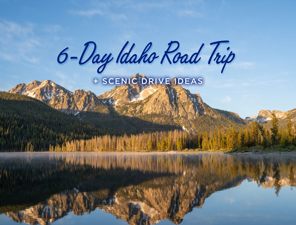 sawtooth mountains reflected in stanley lake with overlaid text reading idaho road trip